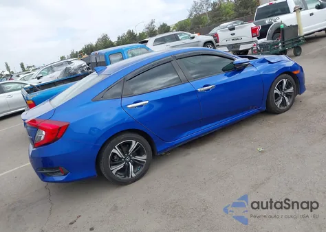 2016 Honda Civic Touring z USA, uszkodzony, nr VIN 2HGFC1F93GH643558